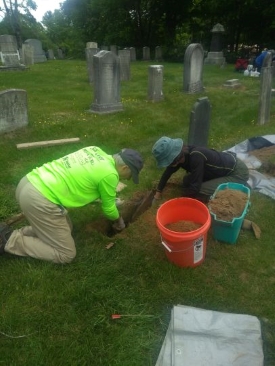 Digging in cemetery 